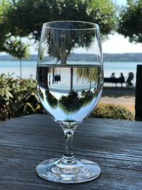 Close-up of wine in glass on table