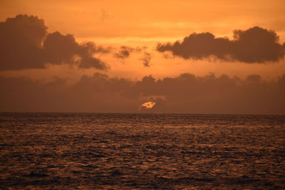 Scenic view of sea against orange sky saint lucia 