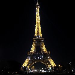 Low angle view of illuminated city at night