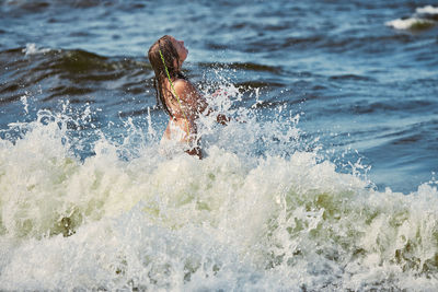 Man swimming in sea