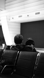 Rear view of people sitting in bus