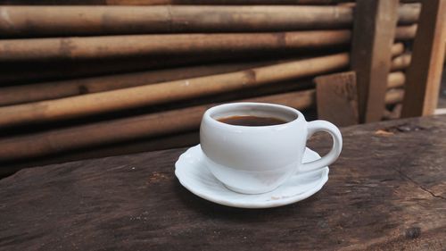 Close-up of coffee cup on table