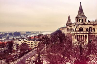 Fishermans bastion in city against sky during winter