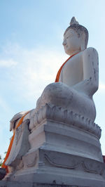 Low angle view of statue against sky
