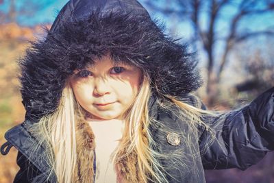 Portrait of smiling young woman in winter