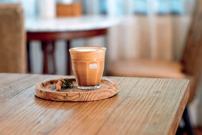 Coffee cup on table in cafe