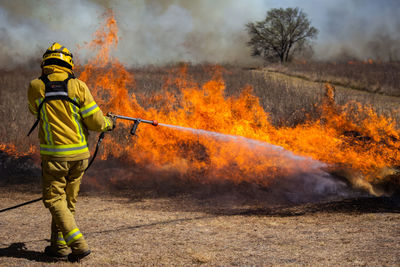 View of firefighter working on field