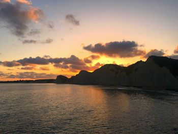 Scenic view of sea against sky during sunset