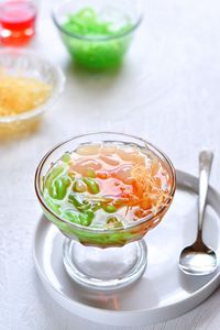 High angle of es campur or mix ice with red syrup in bright mood photography