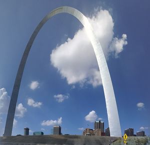 Low angle view of vapor trail against blue sky