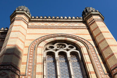 Low angle view of historical building against clear sky