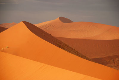 Scenic view of namib desert against sky