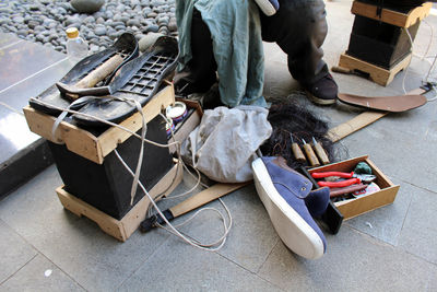 Low section of man working on floor