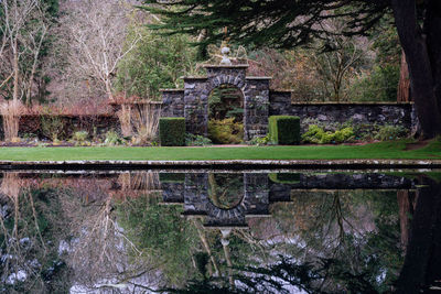 Reflection of old building in lake