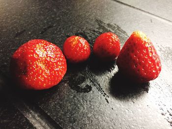 High angle view of strawberries on table