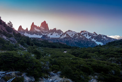 Scenic view of snowcapped mountains against sky