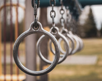 Close-up of play equipment hanging in park