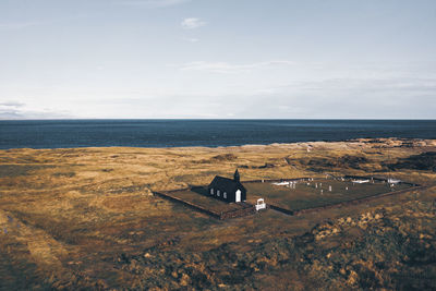 High angle view of sea shore against sky