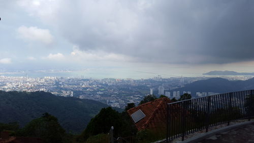 High angle view of buildings in city against sky