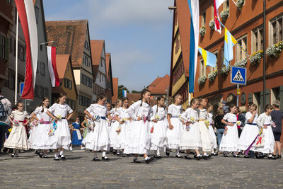 People on street in city