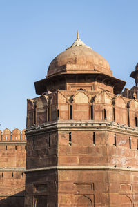 Low angle view of historic building against clear sky