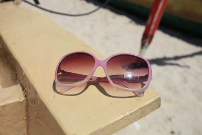 Close-up of sunglasses on table