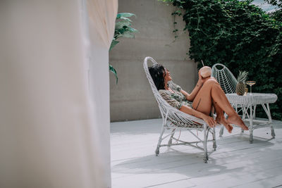 Woman sitting on chair