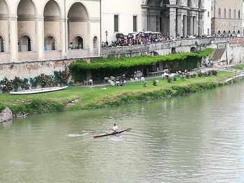 People on boat in river