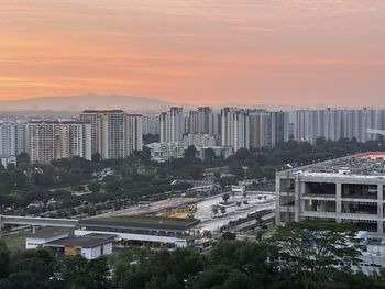 High angle view of cityscape against sky during sunset
