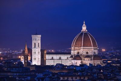 Florence cathedral in city at night