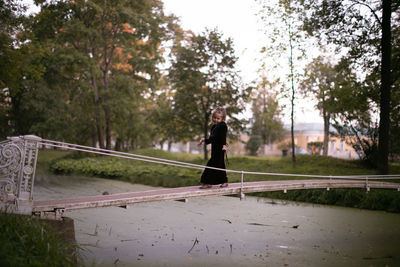 Beautiful little child girl walking in a park