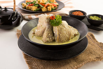 Close-up of food in plate on table