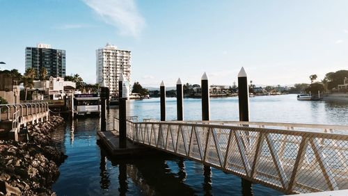 Pier on lake against sky