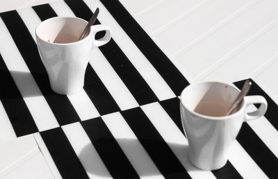 High angle view of coffee cup on table