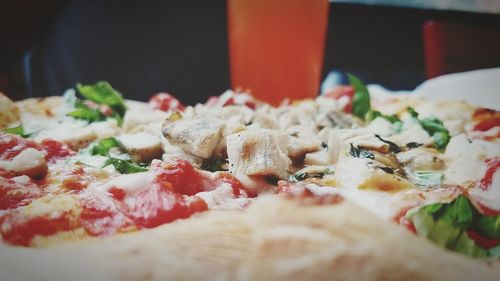 Close-up of pizza served in plate