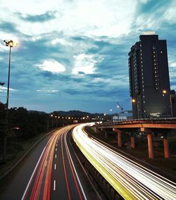 High angle view of light trails on road in city