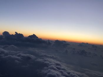 Low angle view of dramatic sky during sunset