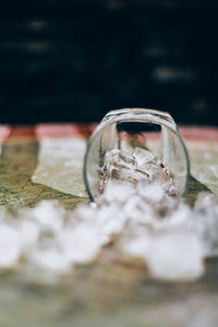 Close-up of glass jar on table