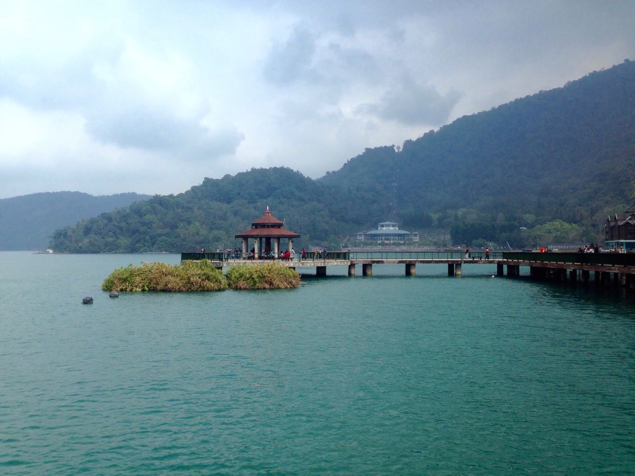 mountain, cloud - sky, sky, mountain range, tranquil scene, travel destinations, scenics, nautical vessel, tree, tranquility, outdoors, idyllic, beauty in nature, water, nature, lake, no people, architecture, day