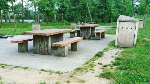 Empty picnic tables in park
