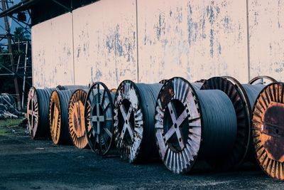 Wires rolled on spools at industrial building