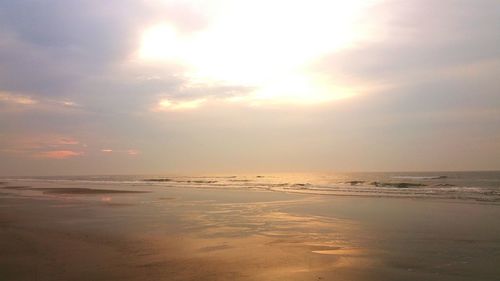 Scenic view of sea at sunset