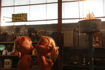 Side view of women looking at camera