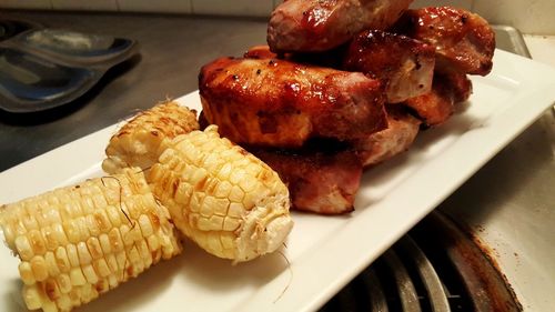 Close-up of meat on barbecue grill