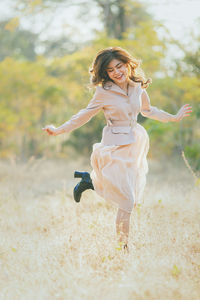 Woman running on field