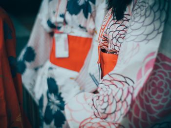 Midsection of women wearing kimonos