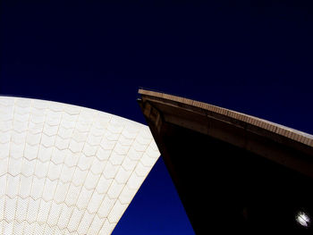 Low angle view of historical building against blue sky