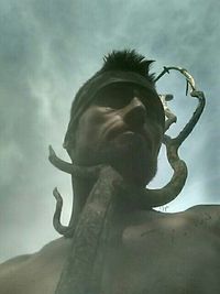 Low angle view of statue against sky