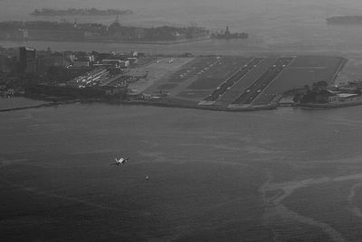 Scenic view of farm against sky