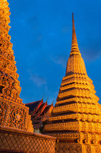 Low angle view of temple against blue sky